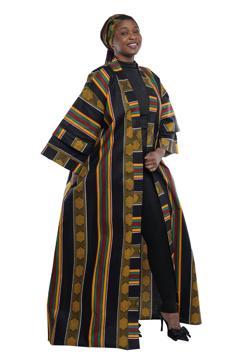 Woman wearing a colorful patterned coat on a white background